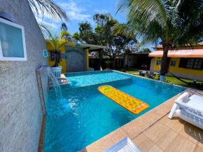 Recantos Pinheiros - Casa inteira, até 11 hóspedes - Piscina privativa, sinuca, e ar condicionado nos 3 quartos - Condomínio Orla 500, lado praia - Unamar, Cabo Frio-RJ